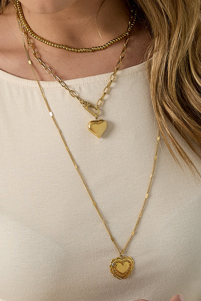 Ketting met platte details en grote hanger